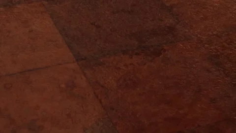 Angled close-up of weathered terracotta floor tiles with a damp, reflective Видео 333191403