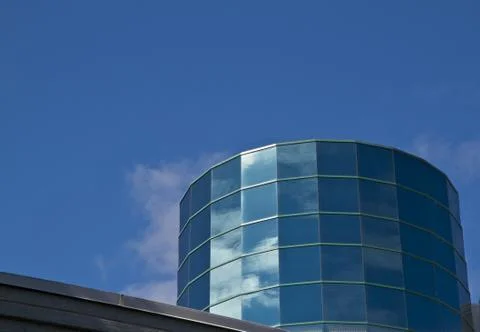 Angled cylinder building right Stock Photos