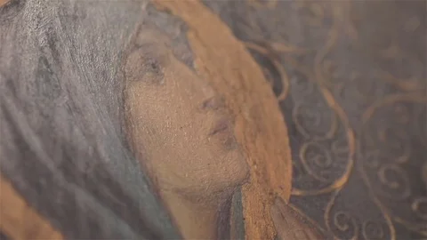Angled detail of icon image of Virgin Mary in St Nicholas Orthodox Cathedral Stock Footage 79963652