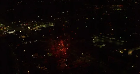 Angled drone aerial over fireworks, night Video stock 102120053