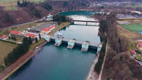 Angled drone push toward hydro dam Stock Footage 330227019