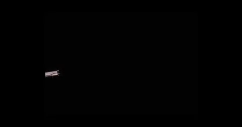 Angled Muzzle Flash VFX Overlay Against Black Background 動画素材 334098753