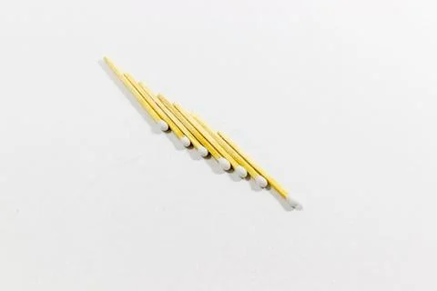 Angled orderly shot of front 7 white match head covered matches Stock Photos