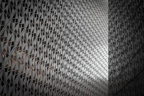 Angled pattern on the facade of a modern architecture building Stock Photos