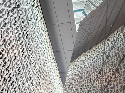 Angled pattern on the facade of a modern architecture building Stock Photos