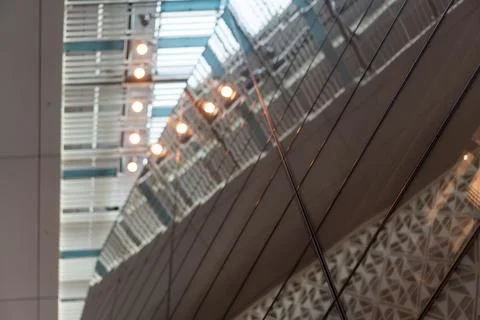 Angled pattern on the facade of a modern architecture building Stock Photos