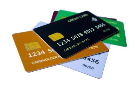 Angled perspective of overlapping multi-colored credit and debit cards on a.. Stock Photos