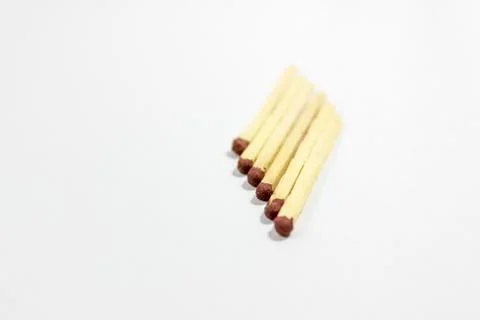 Angled positioned close-up shot of front 6 black match head covered matches Stock Photos