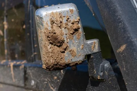 Angled rear-view mirror fixed outside on door of Toyota Land Cruiser Prado Stock Photos
