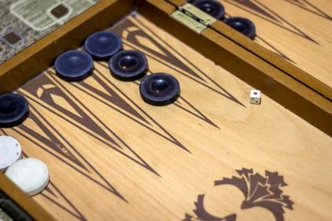 Angled shoot of dice of backgammon under dim light Stock Photos