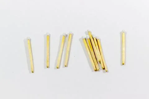 Angled shot of front random spreaded multiple white match head covered matche Stock Photos
