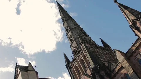 Angled shot showing the Gothic Architecture of Lichfield cathedral, silhouetted Stock-Footage 73497058