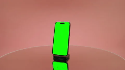 Angled Smartphone With Green Screen Mockup on Pink Stock Footage 334838606