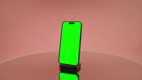 Angled Smartphone With Green Screen Mockup on Pink Stock Footage 335019105