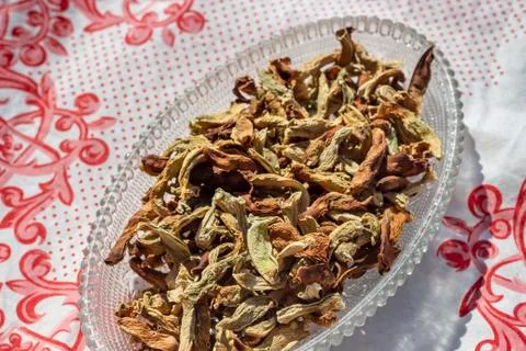 Angled top shoot of dried string beans on tranparent plate Stock Photos
