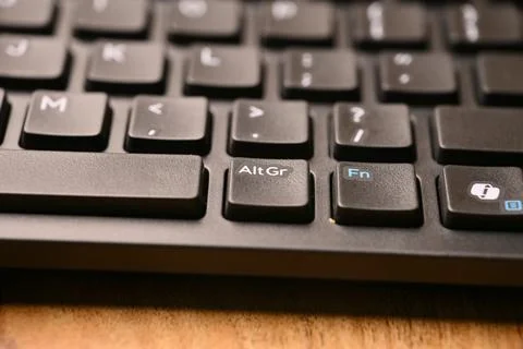 Angled Top View Macro Close-Up Black Computer Keyboard Highlighting AltGr K.. 스톡 사진