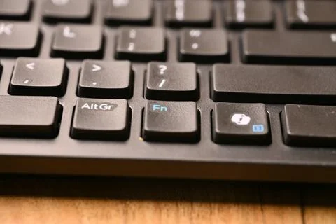 Angled Top View Macro Close-Up Black Computer Keyboard Highlighting Fn Key .. Stock Photos