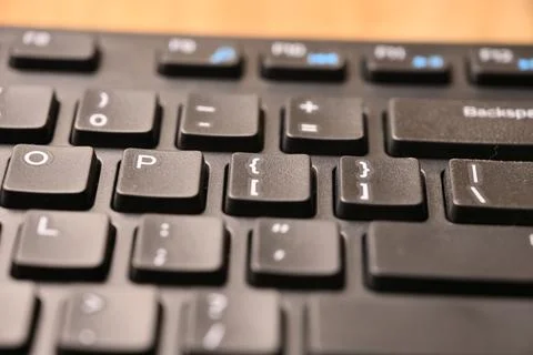 Angled Top View Macro Close-Up Black Computer Keyboard Highlighting Open Br.. 스톡 사진