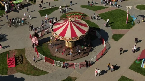 Angled top view of spinning park carousel Stock Footage 322529237