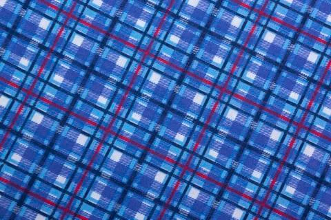 Angled View of Blue Square Patterns on Fabric Stock Photos