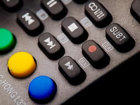 Angled view of a control panel featuring playback, record, and subtitle but.. Stock Photos