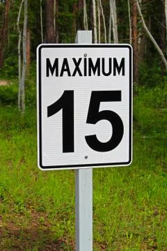 An angled view of a maximum 15 speed limit sign Stock Photos