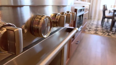 Angled view of stove knobs on panel Video stock 320570469
