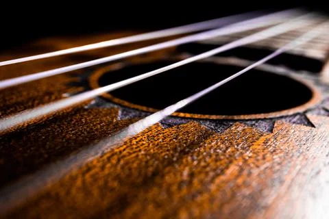 Angled View of Ukulele Strings and Soundhole Stock Photos