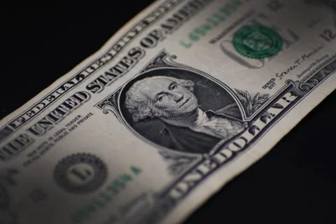 Angled view of US Dollar bill in shadows Stock Photos