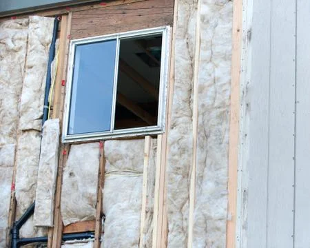 Angled view of a window under construction, empty space right Foto stock