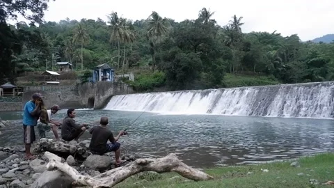 Angler on the dam Marente Sumbawa Stock Footage 232172541