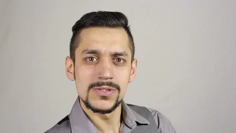 Angry Aggressive bearded man showing Fuck you sign, the middle finger Stock Footage 75348337