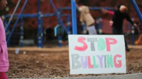 Angry Asian Girl With Stop Bullying Sign At School Stock Footage