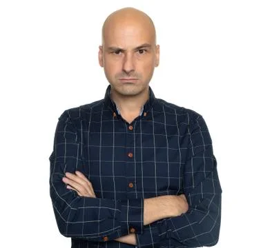 Angry bald man with hands folded isolated Foto stock