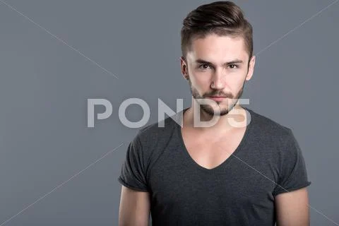 Angry bearded young man Stock Photos