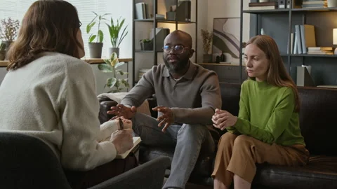 Angry Black Man Walking out of Couples Therapy Session Leaving Woman Crying Stock Footage 337639885