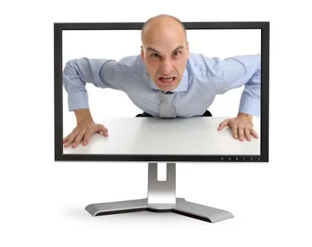 Angry boss screaming through the computer monitor Stock Photos