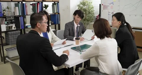 Angry boss throwing and slamming on document Stock Footage 225592363