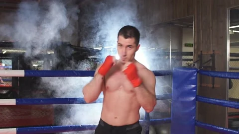 Angry boxer man in fight Stock Footage 121963547