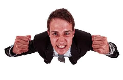 Angry business man with red exploding face 写真素材