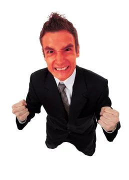 Angry business man with red exploding face 写真素材