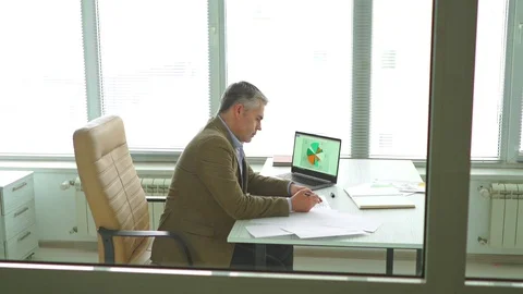 The angry businessman throwing papers at the table. slow motion Stock Footage 105203816