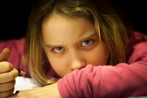 Angry child is drawing Stock Photos