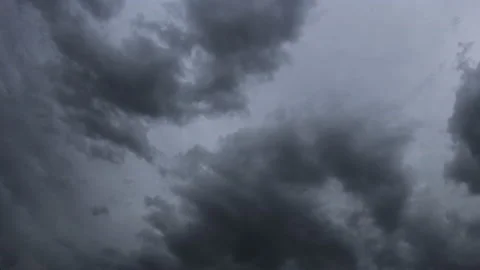 Angry clouds coalesce to fill the sky, 4K. Stock Footage 158493115