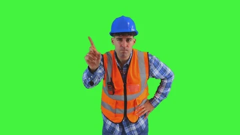 Angry construction worker reprimanding the camera with finger, wearing oran.. Stock Footage 286985743