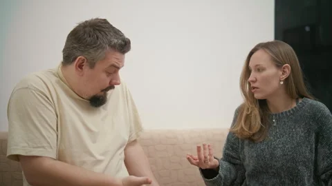 Angry couple arguing over cheating on the phone Stock Footage 340931733