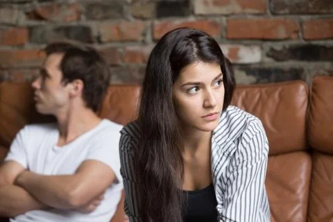 Angry couple avoiding talking after family fight Stock Photos