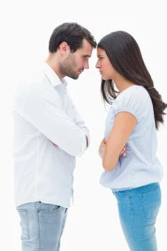 Angry couple facing off after argument Fotos de archivo