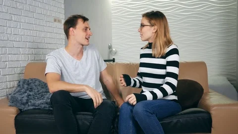 Angry couple fighting and strangling at home. Angry young couple fighting and Stock Footage 121503629