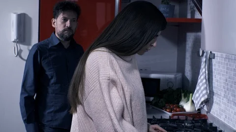 Angry couple fighting in kitchen during quarantine stressed out by isolation Stock Footage 129358982